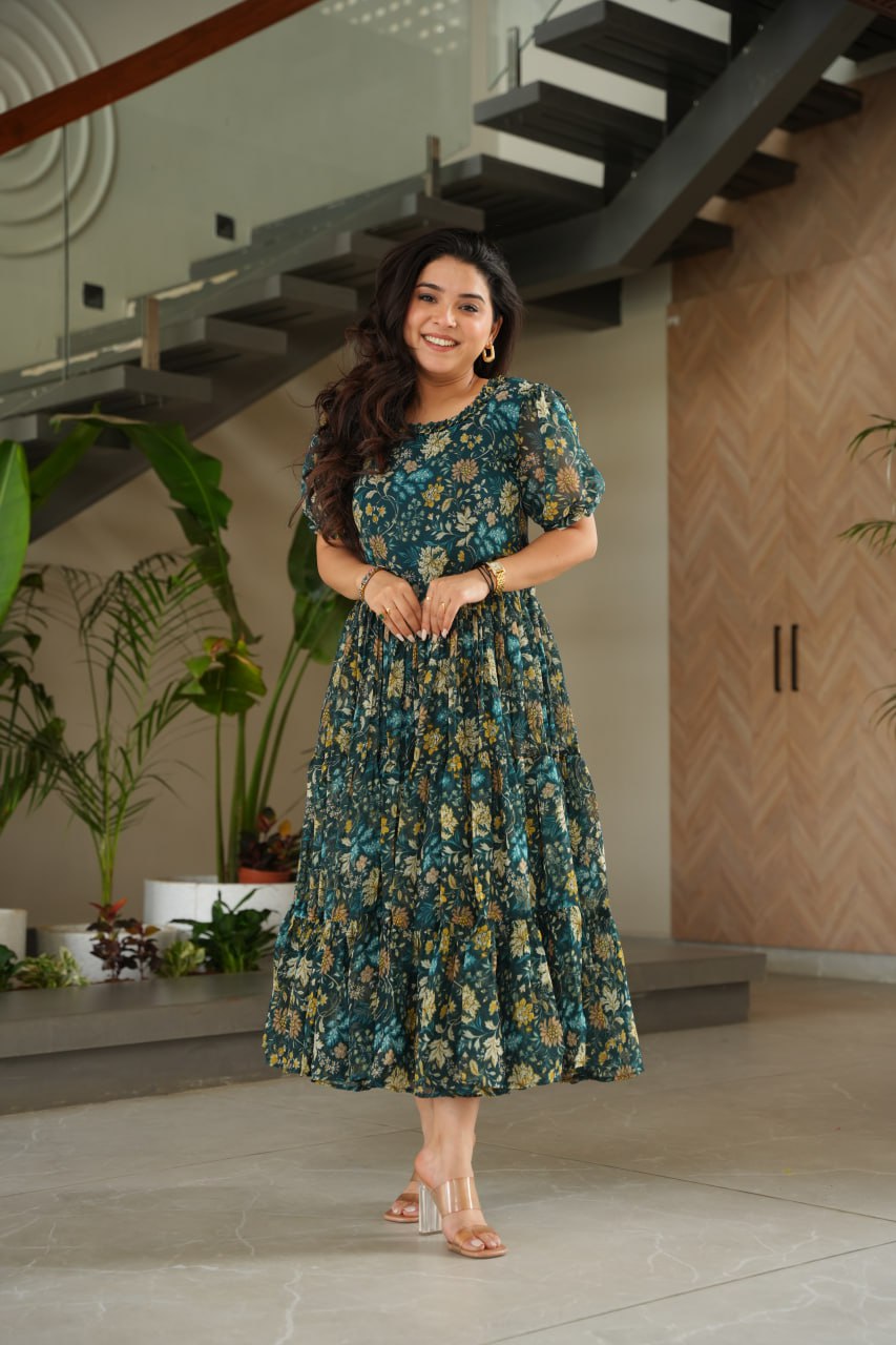 Vikarni Green Printed Anarkali Gown in faux georgette with 12-meter flair – perfect ethnic wear for women, long gown for women, printed gown for girls, Anarkali gown for wedding, georgette gown for festive wear, Indian dress for women, traditional wear for haldi ceremony, party wear gown online, readymade gown under 1000, stylish green ethnic gown for mehndi function.